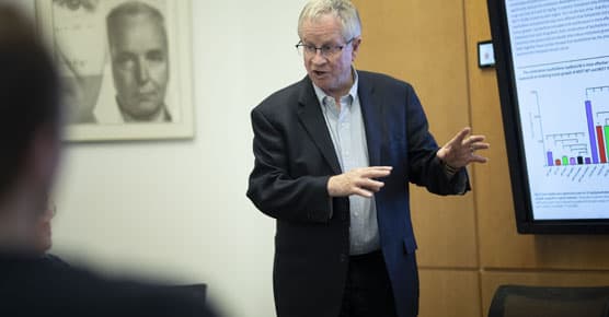 Geoffrey Greene, PhD, presenting to group