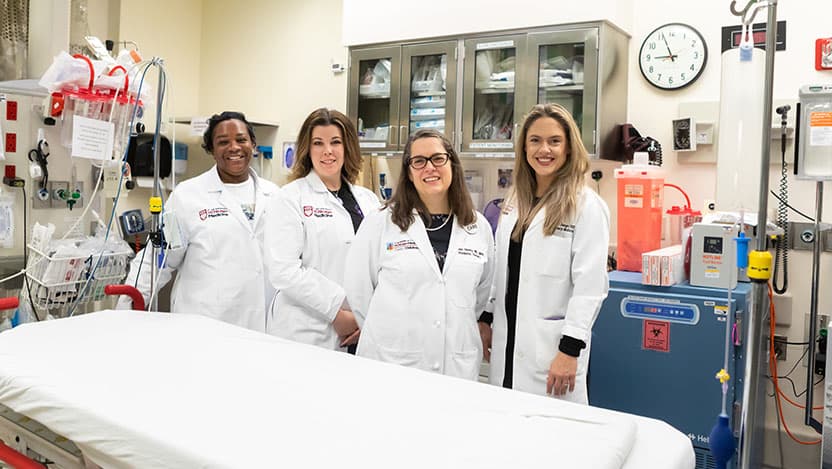 Trauma Team: (R-L) Lindsay Jaeger, MD; Marion Henry, MD, MPH; Erin Rogala, RN, CFRN, CEN; Shamae Phagan, MSN, RN, TNS.