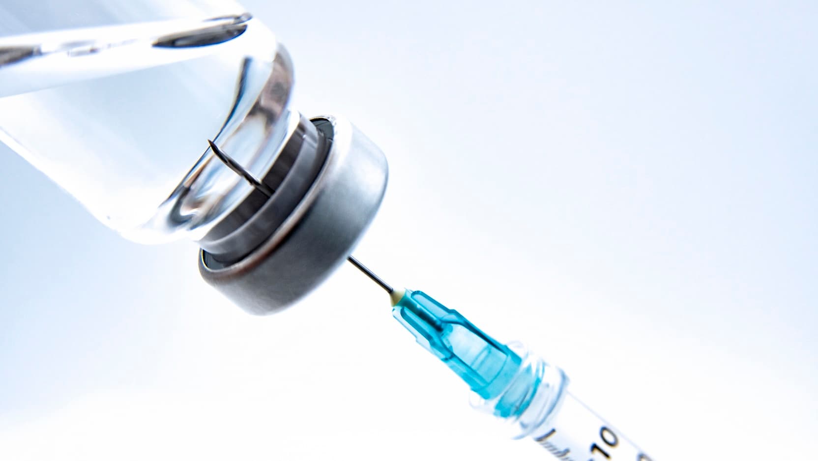 Vaccine vial and needle
