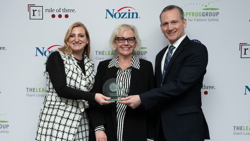 The Leapfrog Group President & CEO Leah Binder (center) presented the University of Chicago Medical Center's Top Teaching Hospital award to Samantha Ruokis, VP of Clinical Performance Excellence, and Dr. Tom Spiegel, VP & Health System Chief Quality Officer, at a ceremony in Washington, D.C.