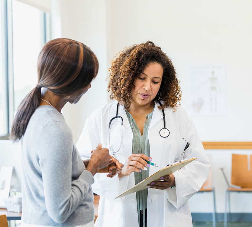Image of doctor talking about medical results to a patient