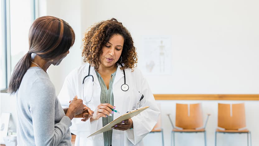Image of doctor talking about medical results to a patient