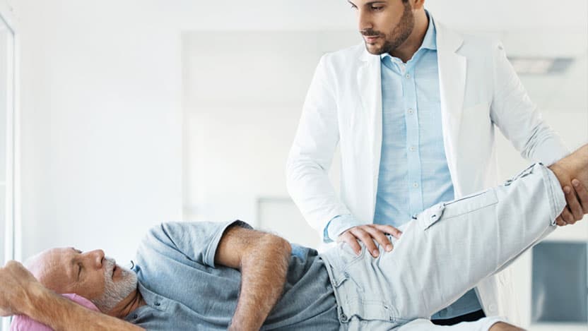 man receiving physical therapy