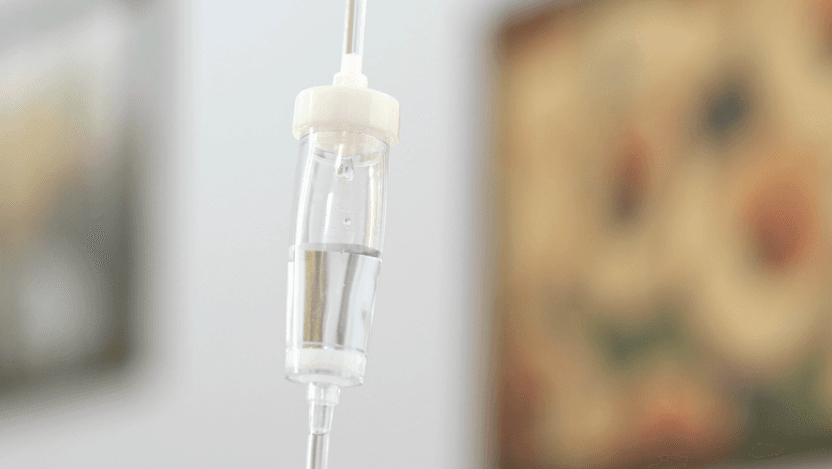 Intravenous drip with a drop of medicine close-up