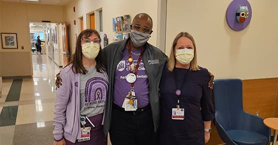 Members of the pediatric rheumatology team, including Carolyn Zic, MSN and Cuoghi Edens, MD