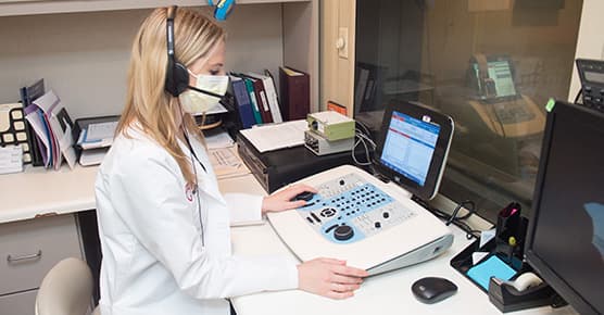 Image of audiologist Jamie Natkin working on audiogram