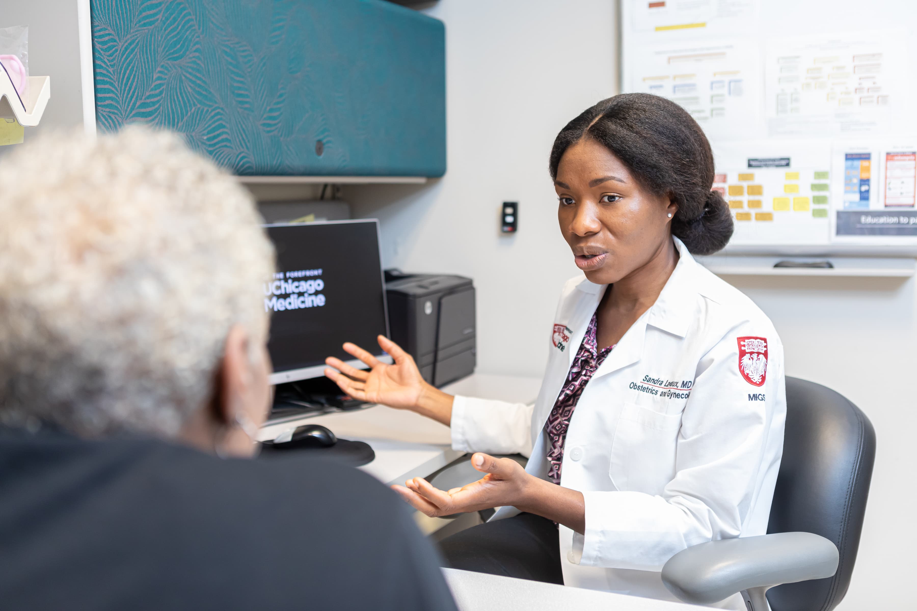 Dr. Wong consults a patient