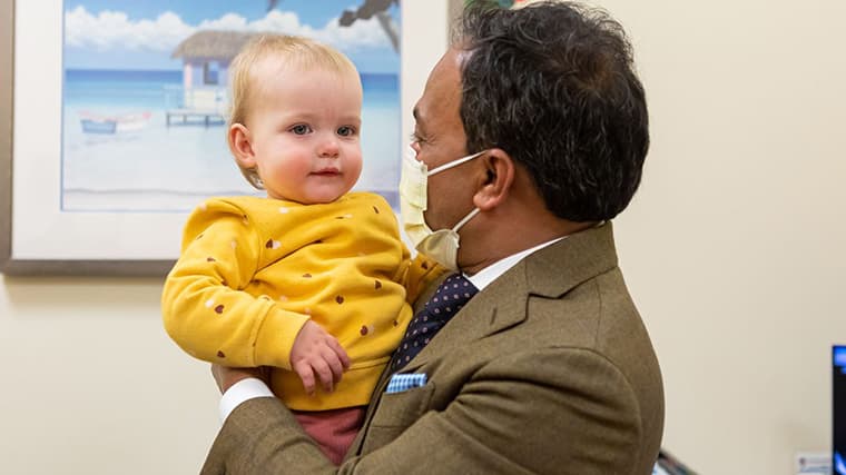 Dr. Gundeti working with pediatric urology patient